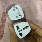 NEW  TRAVEL ADAPTER  (1 PIS)